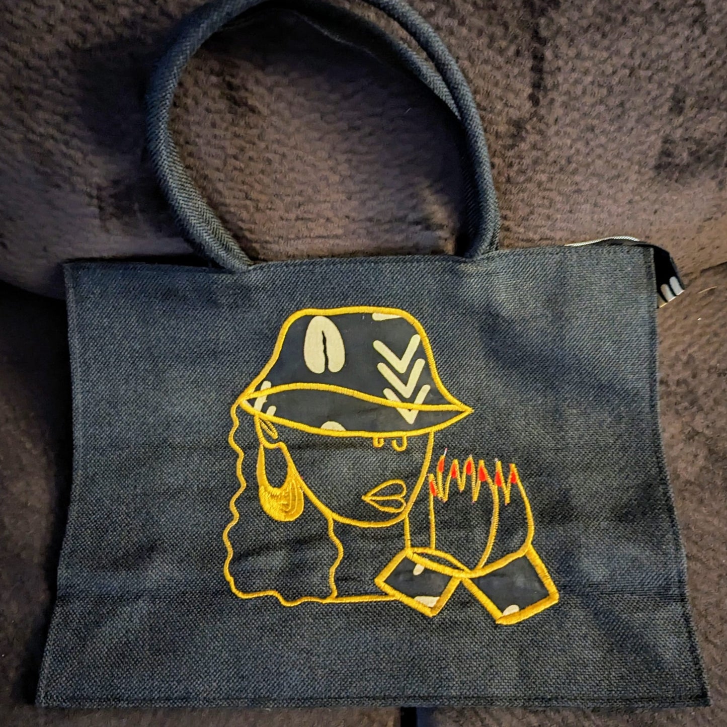 Black canvas with women face Bag with Handles